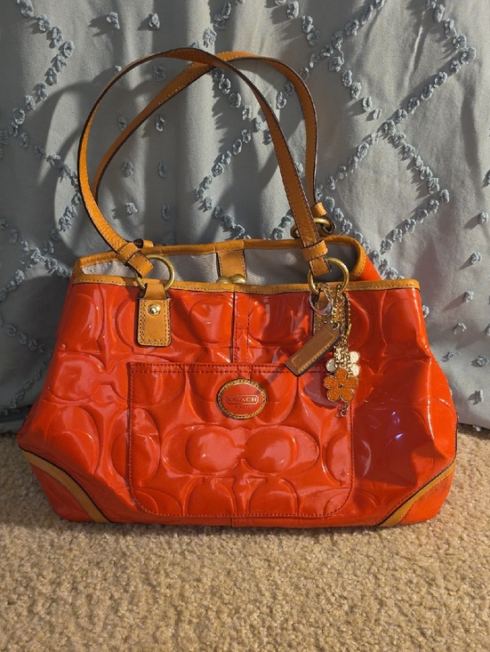 Coach Handbags - Coach Orange Patent Leather Shoulder Bag with Charm